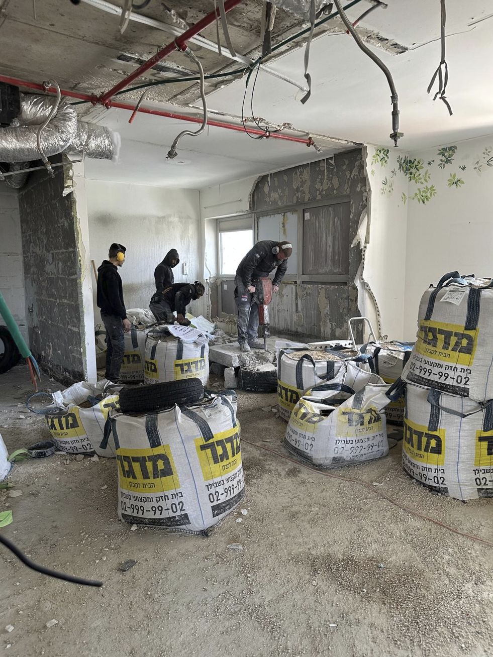 Demolition in progress with a jackhammer