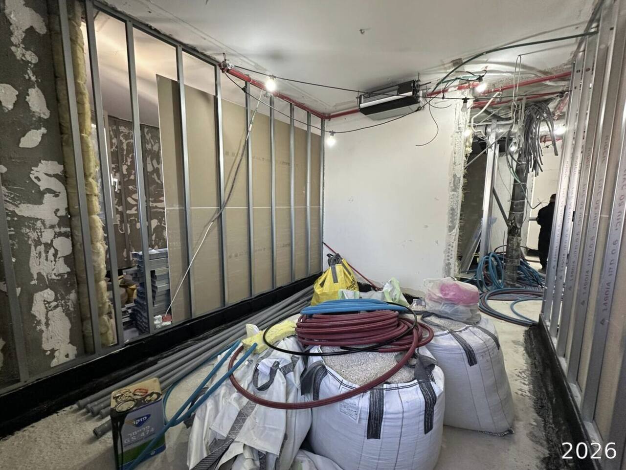 Wall framing with MEP rough-in overhead