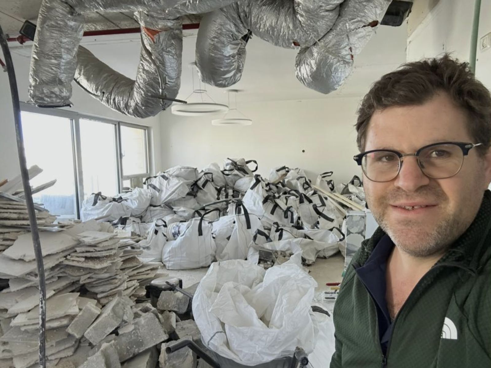 Exposed ductwork during ceiling demolition