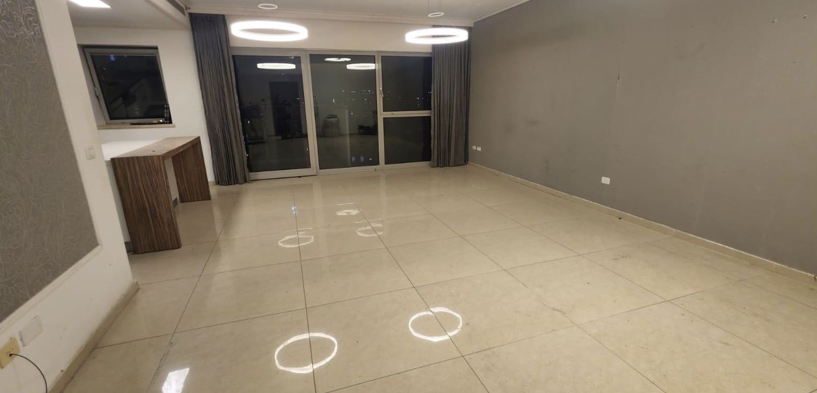 Kitchen and open living area before renovation